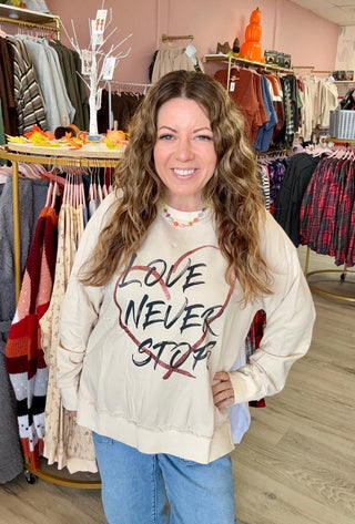 Love Never Stops Sweater