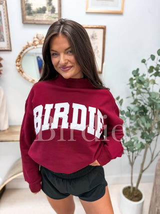 BIRDIE Embroidered Mock Neck Pullover in Maroon