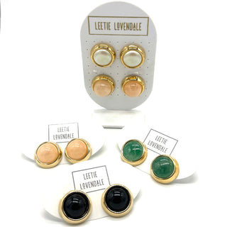 Set of earrings on display cards with 'Leetie Lovendale' branding.