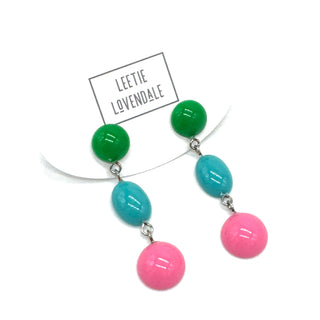 Earrings with green, blue, and pink beads on a white background with 'Leetie Lovendale' branding.