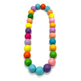 Colorful beaded necklace on a white background