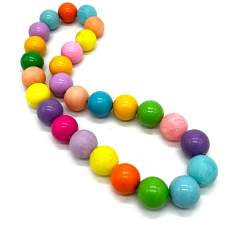 Colorful beaded necklace on a white background