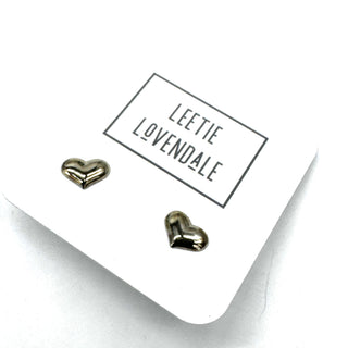 Heart-shaped earrings on a card with 'Leetie Lovendale' branding.