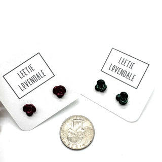 Two pairs of earrings on cards with 'Leetie Lovendale' branding, next to a quarter for scale.