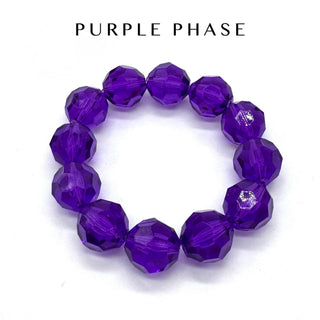 Purple beaded bracelet on a white background with 'Purple Phase' branding.