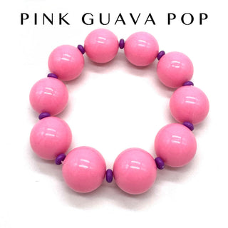 Pink beaded bracelet with purple accents on a white background, branded 'Pink Guava Pop'.