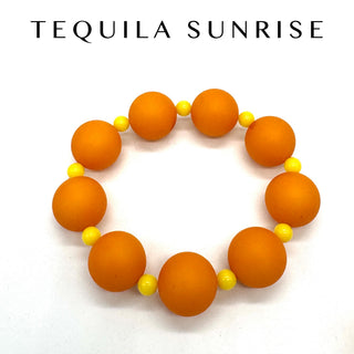 Orange and yellow bead bracelet with 'Tequila Sunrise' text on a white background
