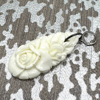 The Leetie Pendant & Charm Bar
